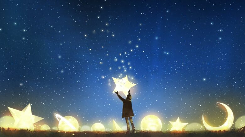 星を掴む男性